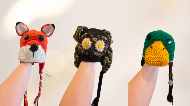 Colorful crocheted fox, owl, and duck hats handmade by Colorado Springs local maker Holly Smith.