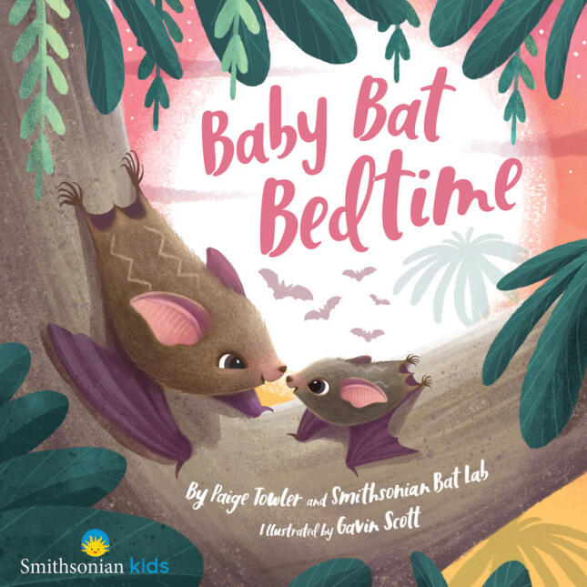 Illustrated cover of Baby Bat Bedtime showing an adult bat and baby bat touching noses while hanging from a tree branch, surrounded by tropical leaves and a warm pink sunset sky.